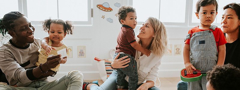Children playing with caregivers