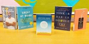 Book covers for T is for Transformation by Shaun T; Great at Work: How Top Performers Do Less, Work Better, and Achieve More by Morten T. Hansen; Outer Order, Inner Calm: Declutter and Organize to Make More Room for Happiness by Gretchen Rubin; Tinker, Dabble, Doodle, Try by Srini Pillay, M.D.; and The Financial Diet: A Total Beginner's Guide to Getting Good With Money by Chelsea Fagan