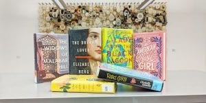 Book covers for The Widows of Malabar Hill by Sujata Masey, The Dream Lover by Elizabeth Berg, The Lady From the Black Lagoon by Mallory O'Meara, All-American Muslim Girl by Nadine Jolie Courtney, Song of a Captive Bird by Jasmin Darznik, Rebel Girls by Elizabeth Keenan