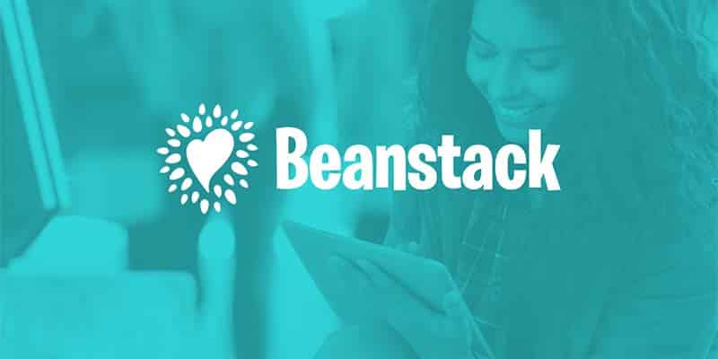 Beanstack logo with an adult using a tablet in the background