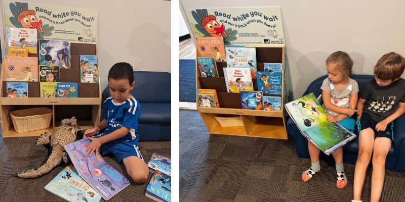 Children read and play around a bookshelf